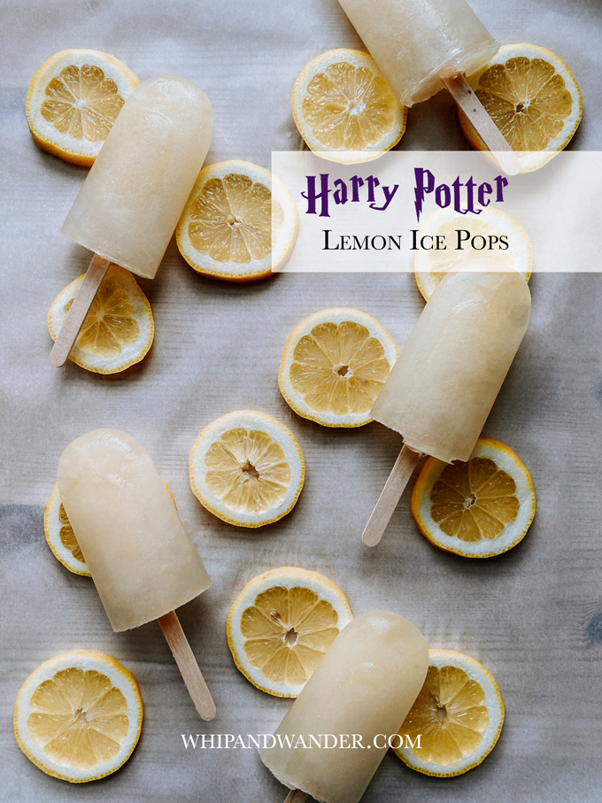 harrypotter inspired lemon popsicles resting on slices of lemon