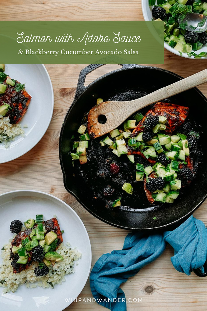 two white bowls resting next to a cast iron pan filled with salmon and avocado, cucumber, blackberry salsa