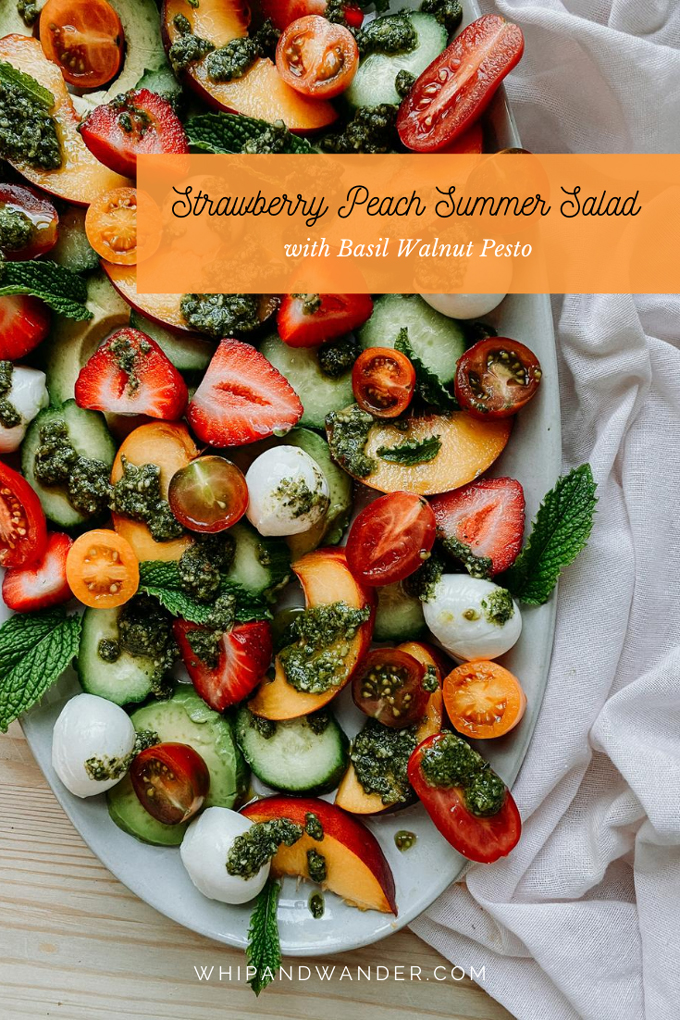 a summer salad of peaches, strawberries, mozzarella, and peso on a white dish with a white towel under the dish