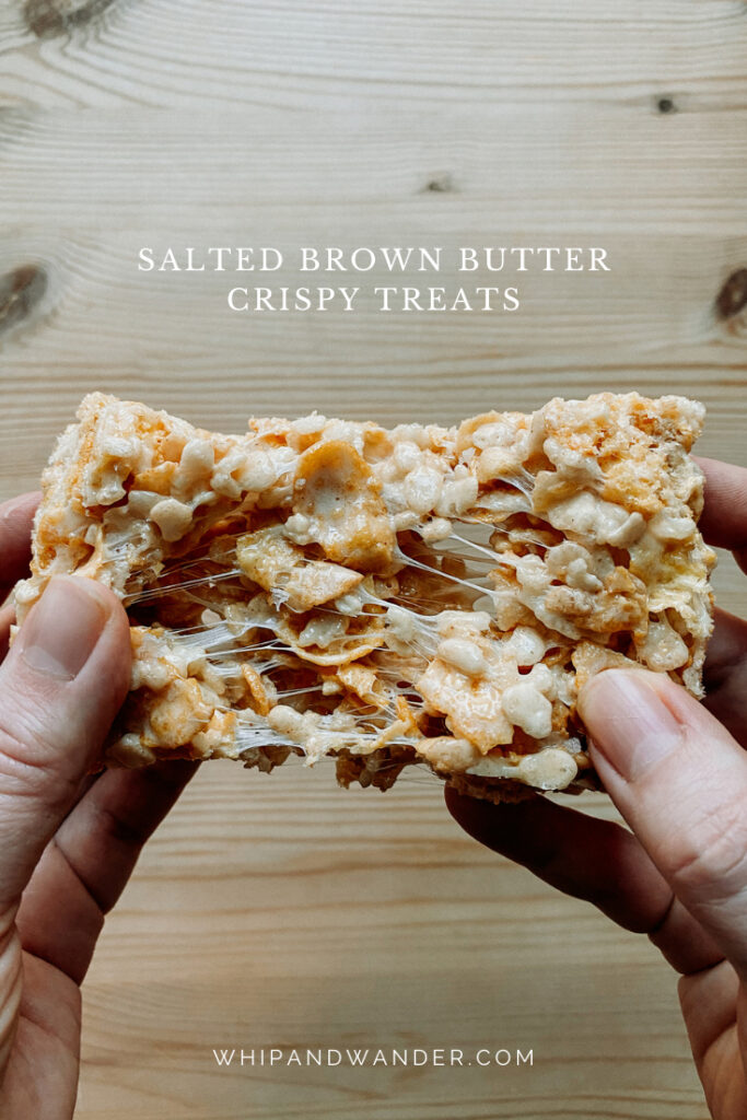hands pulling apart a marshmallow crispy treat