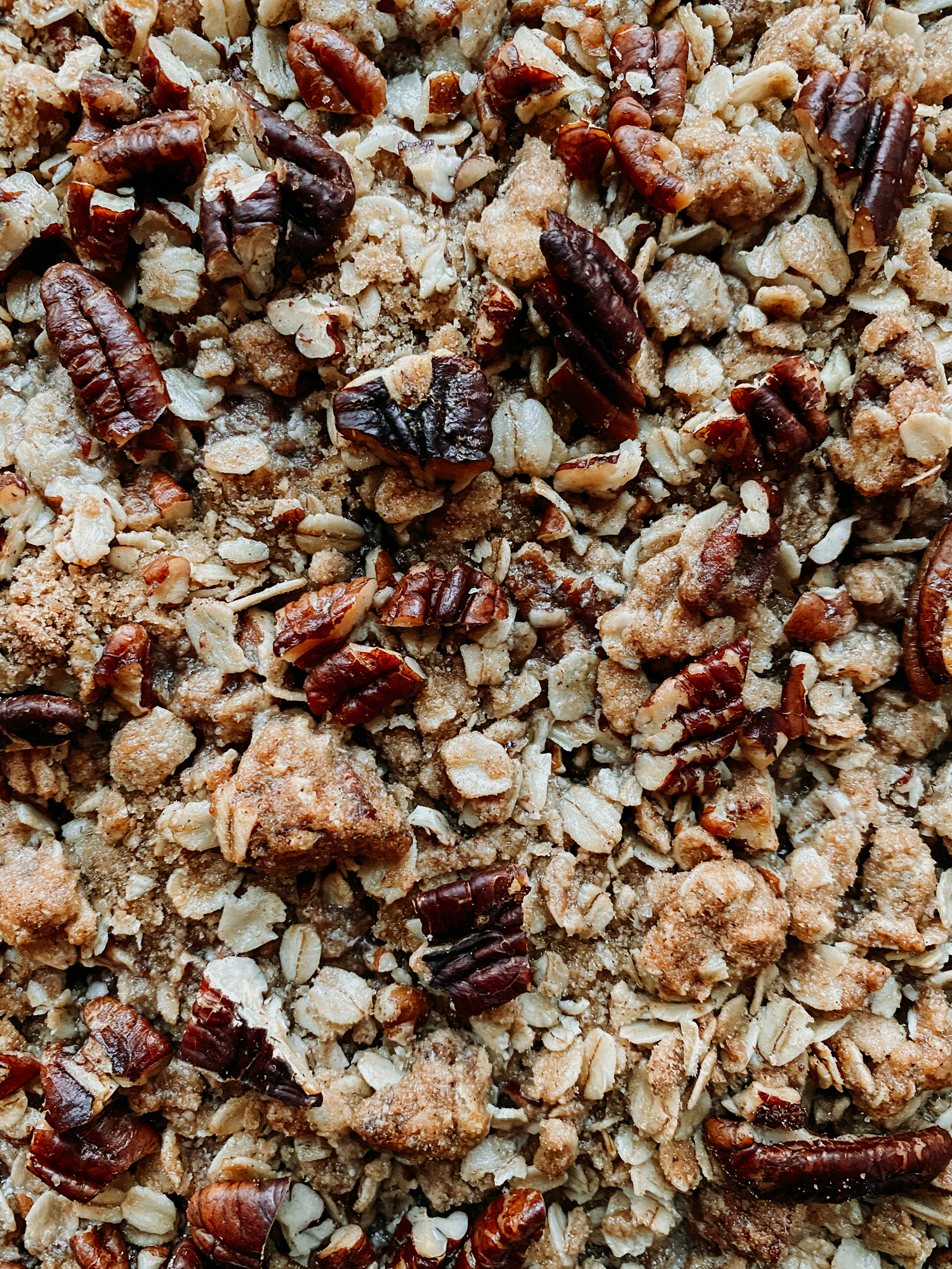 a closeup of a baked Spiced Pear Crisp after it's been pulled from the oven