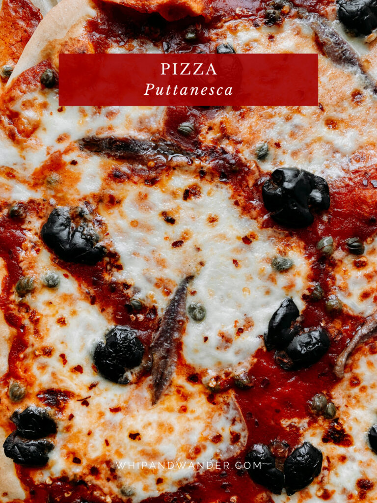 closeup of toppings on a Pizza Puttanesca