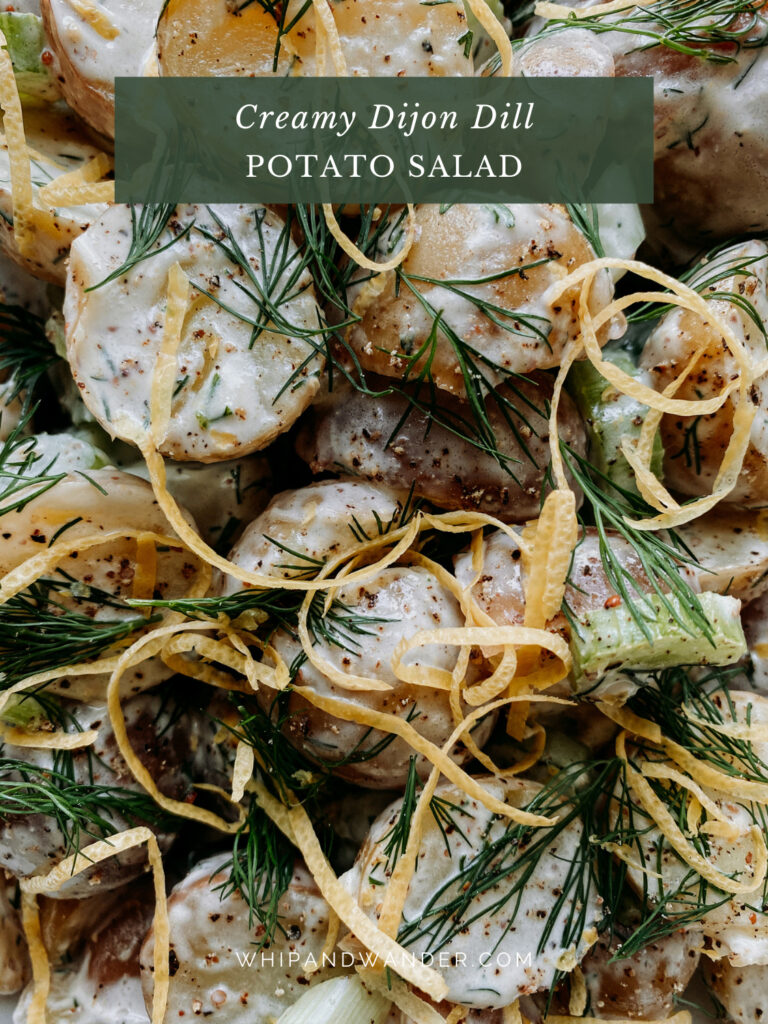 lemon peel and celery dotting an herbaceous potato salad