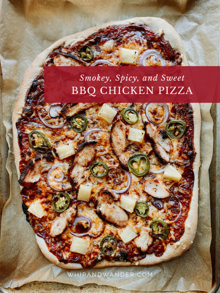 a large freshly baked BBQ Chicken Pizza resting on its baking sheet