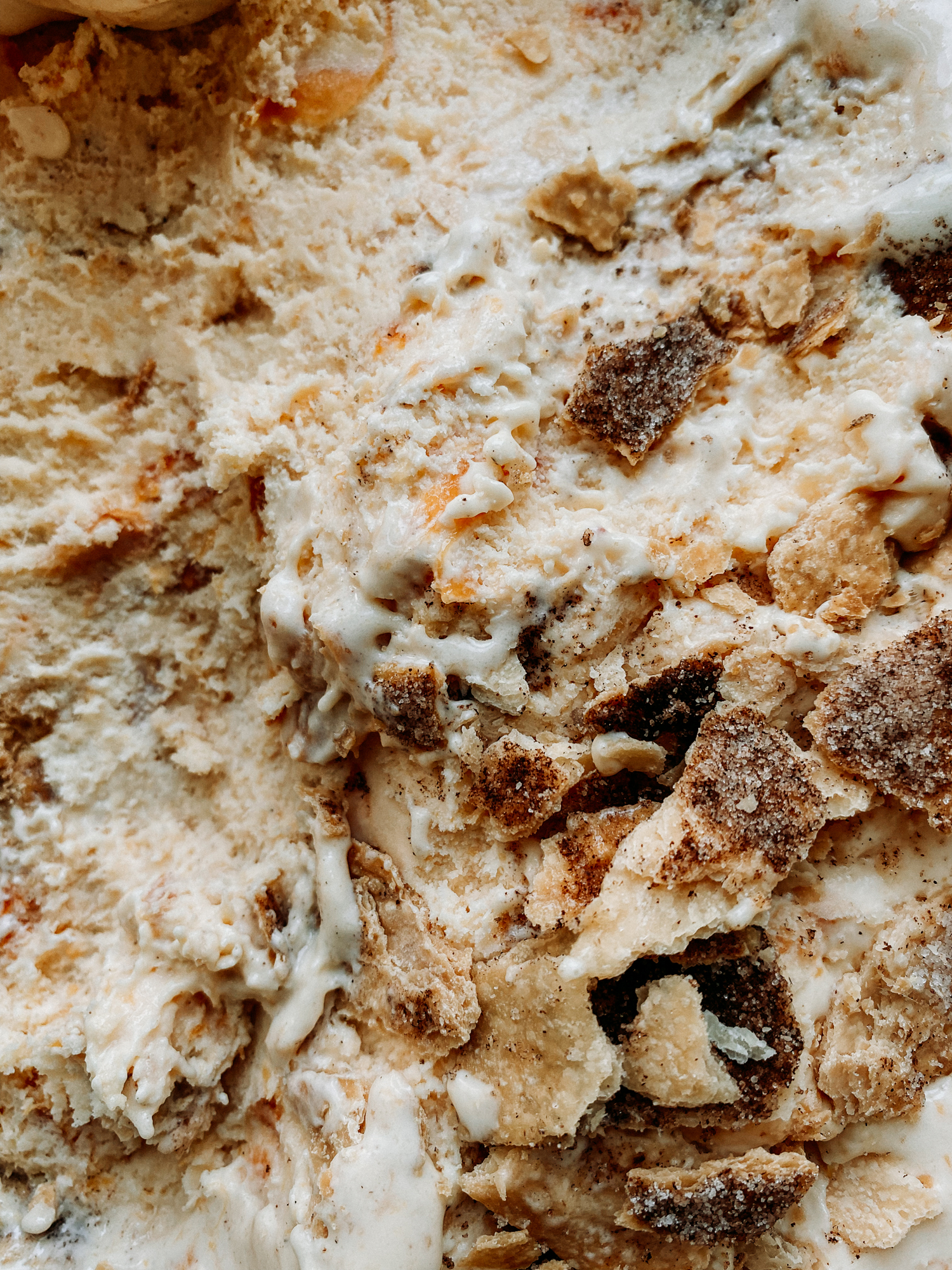 closeup of the texture of peach pie ice cream
