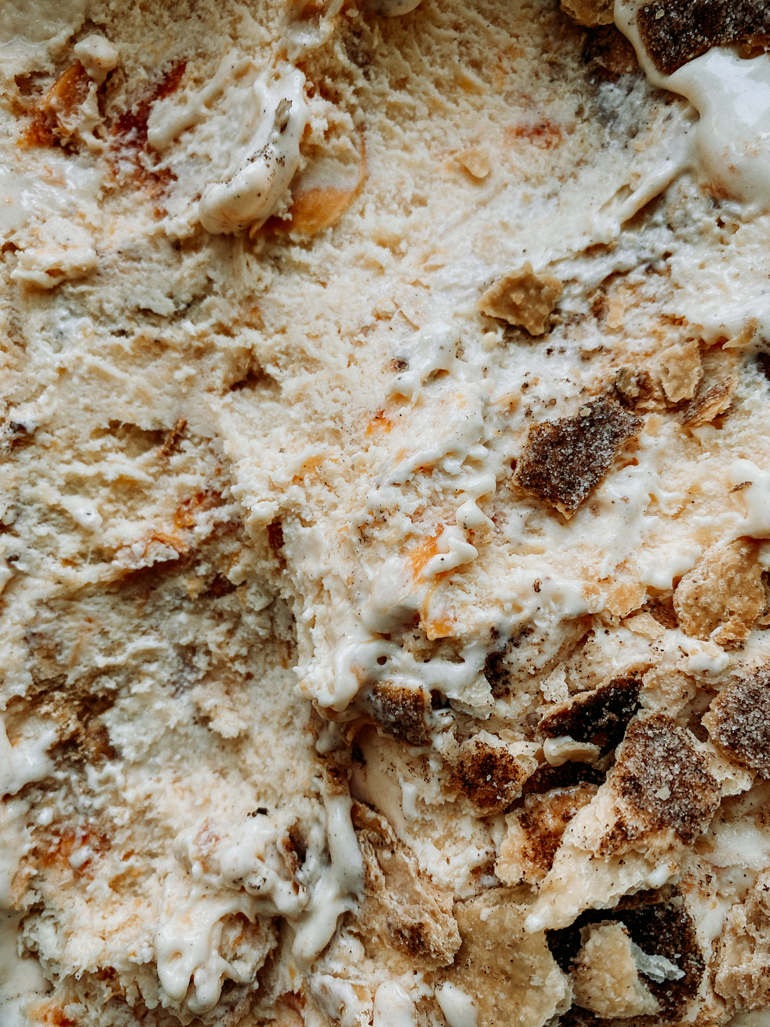 closeup of the texture of buttermilk peach pie ice cream