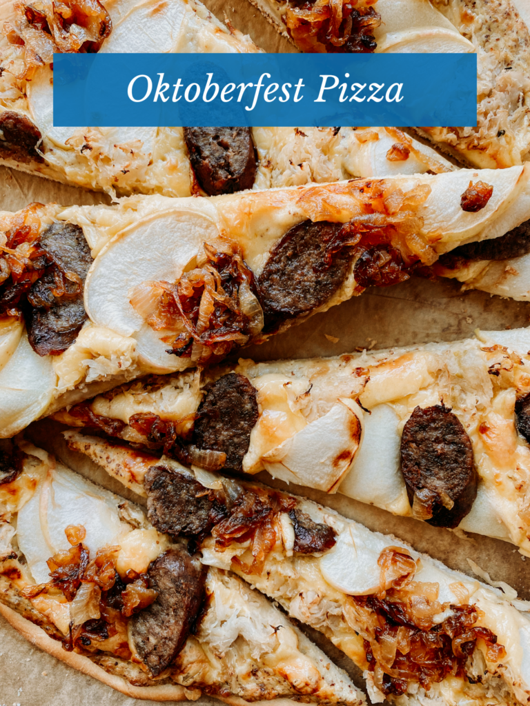 slices of pizza with apples, gouda, sauerkraut, onion, and gouda