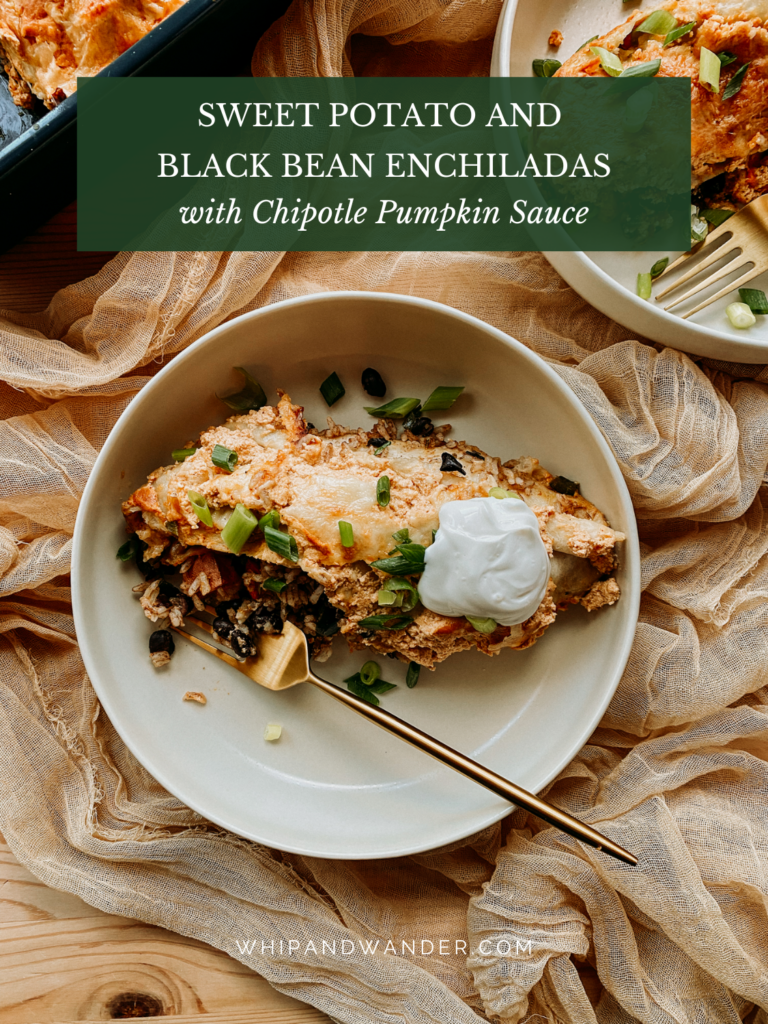 a shallow bowl with a sweet potato black bean enchilada on a gauzy tan cloth