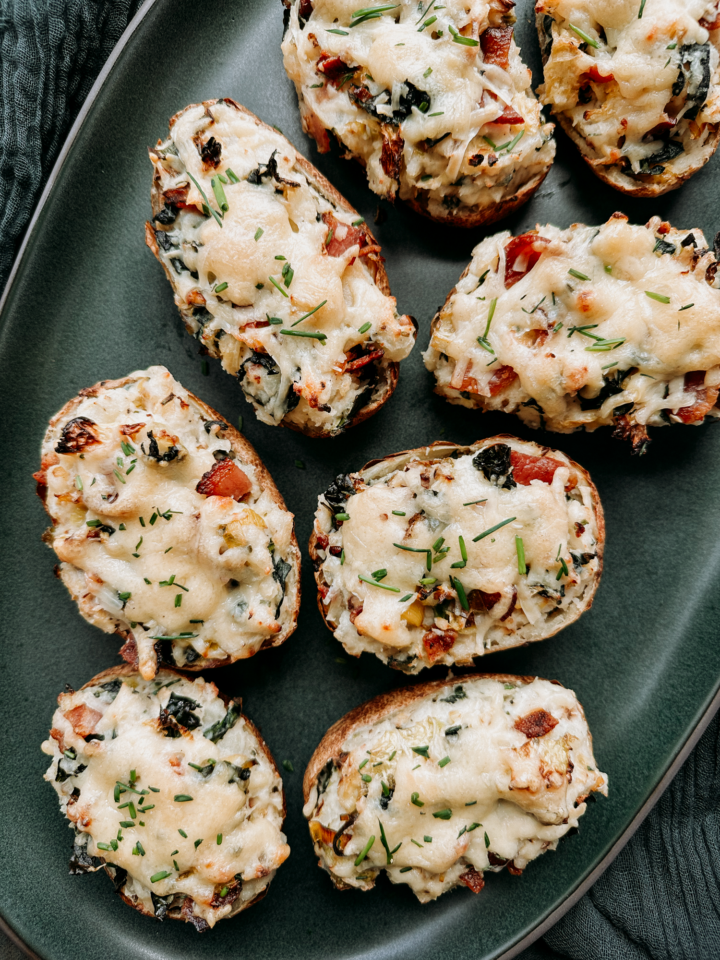 a green plate topped with Twice-Baked Colcannon Potatoes