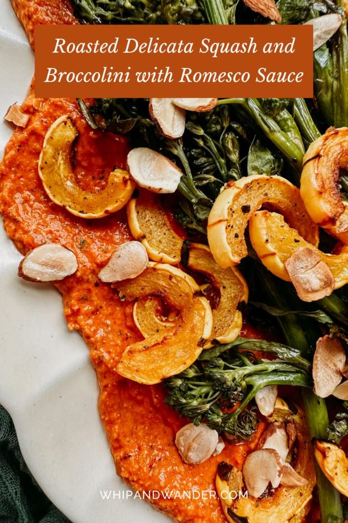 a closeup of almonds, broccolini, squash, and romesco sauce