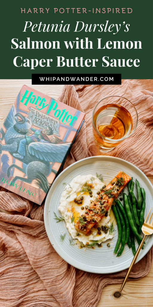 a pink cloth with a plate of salmon and mash and green beans next to a harry potter book