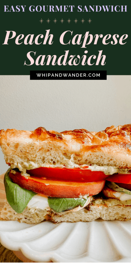 Close-up of a Peach Caprese Sandwich layered with basil, mozzarella, peach slices, and tomato on toasted focaccia, served on a scalloped white plate.