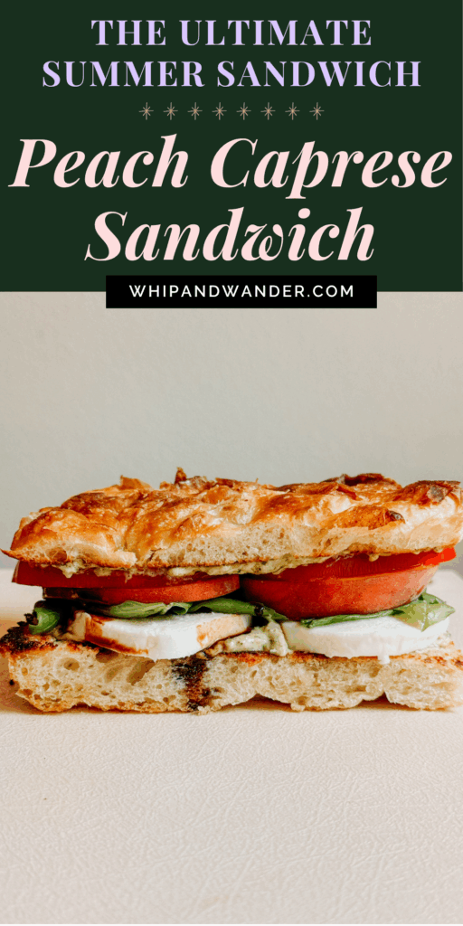 Wide-angle view of a Peach Caprese Sandwich on a scalloped plate with a green napkin underneath, featuring layers of tomato, basil, peach, and mozzarella on toasted focaccia.