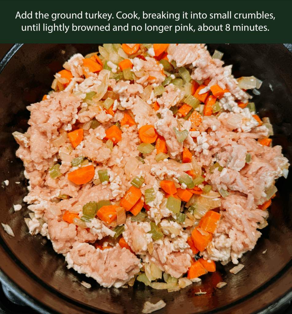Ground turkey browning with onions, celery, and carrots.