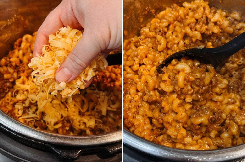 Freshly shredded cheddar added to cooked beef macaroni, then stirred into a creamy cheese sauce coating the pasta.